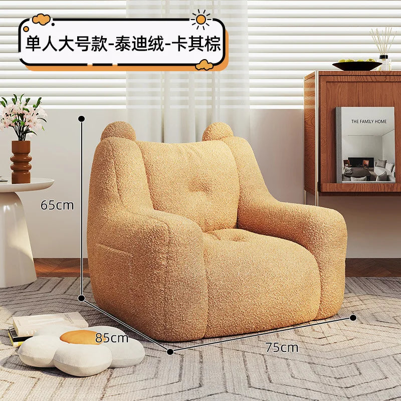 A sofa and a bear-shaped sofa.