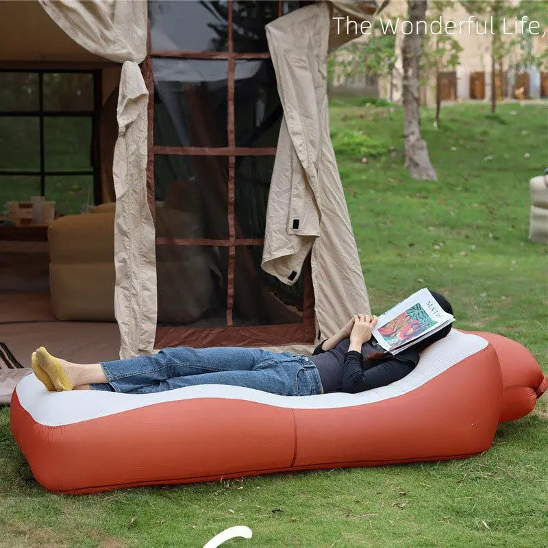 Multipurpose inflatable mattress - for camping, beach, and outdoor activities.
