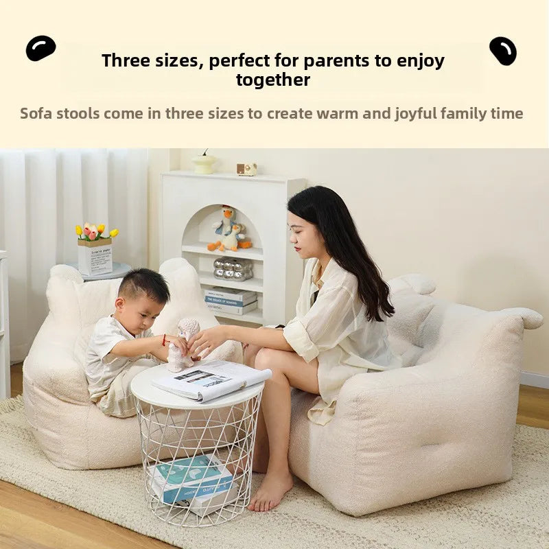 A sofa and a bear-shaped sofa.