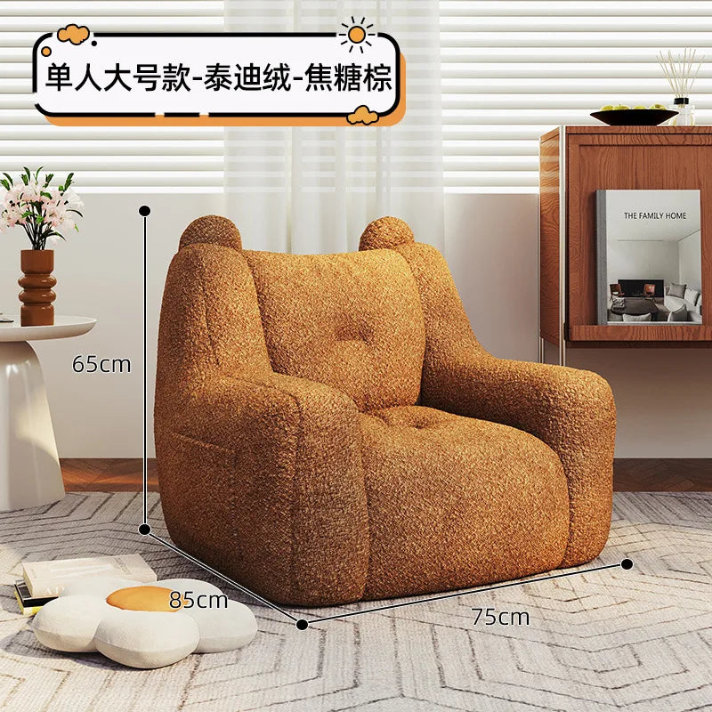 A sofa and a bear-shaped sofa.