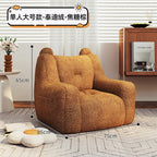 A sofa and a bear-shaped sofa.