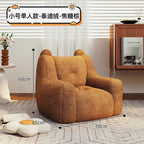 A sofa and a bear-shaped sofa.